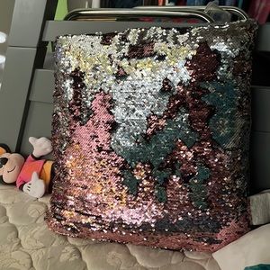 A light pink Sequence pillow